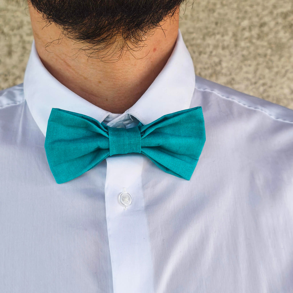 noeud papillon uni turquoise coton lagon profond porté face