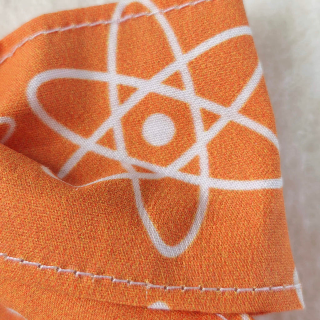 noeud cheveux pince crocodile orange motif atome science piece unique détail